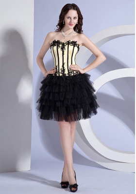 Appliques Decorate Bodice Light Yellow and Black Knee-length Ruffled Layers 2013 Prom Dress