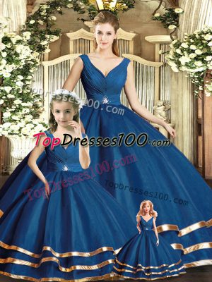 Sleeveless Tulle Floor Length Backless Quince Ball Gowns in Navy Blue with Beading and Ruffled Layers