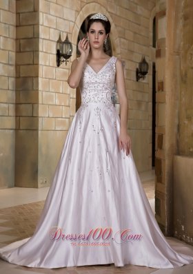 Luxurious A-line V-neck Chapel Train Taffeta Beading Wedding Dress