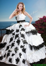 Fashionable Black and White Quinceanera Dress with Appliques and Ruffled Layers