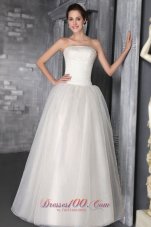 Beautiful A-Line/Princess Strapless Floor-length Organza Beading Wedding Dress