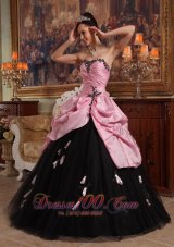 pink and black ball gowns