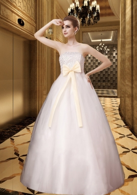 Beautiful Champagne Bowknot Strapless A Line Beading Wedding Dress