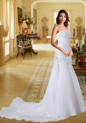 Popular Mermaid Strapless Brush Train Wedding Dresses with Appliques