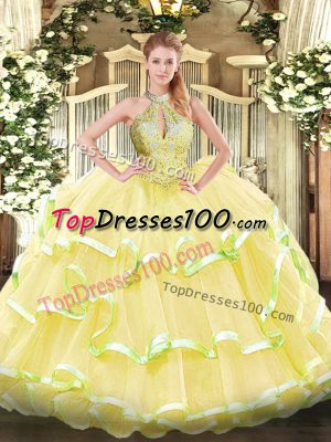 Yellow Ball Gowns Organza Halter Top Sleeveless Beading and Ruffled Layers Floor Length Lace Up Quinceanera Gown