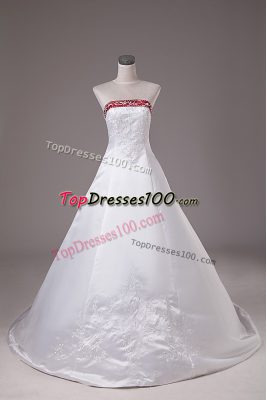 Most Popular Satin Strapless Sleeveless Brush Train Lace Up Beading and Embroidery Wedding Gowns in White