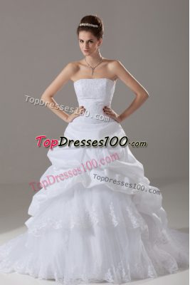 A-line Sleeveless White Bridal Gown Brush Train Lace Up