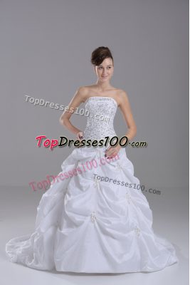 Spectacular Strapless Sleeveless Wedding Gowns Brush Train Beading and Pick Ups White Taffeta