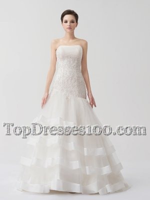 Tulle Strapless Sleeveless Brush Train Lace Up Beading and Appliques and Ruffled Layers Wedding Gown in White
