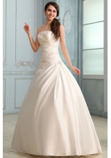 A-Line Strapless Floor-length Beading Lace Up Wedding Dress in Champagne