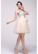 Champagen A-line Sweetheart Beaded Knee-length Prom Dress