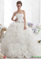 Luxurious White Strapless Wedding Dresses with Rolling Flowers and Chapel Train