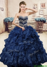 Unique Beaded and Ruffled Organza Quinceanera Dress in Navy Blue