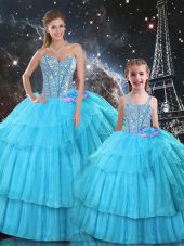 Aqua Blue Ball Gowns Sweetheart Sleeveless Organza and Tulle Floor Length Lace Up Ruffled Layers and Sequins Sweet 16 Dresses