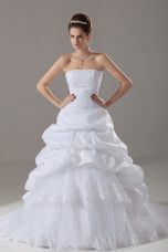 A-line Sleeveless White Bridal Gown Brush Train Lace Up
