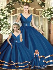 Sleeveless Tulle Floor Length Backless Quince Ball Gowns in Navy Blue with Beading and Ruffled Layers