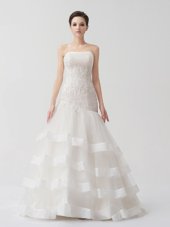 Tulle Strapless Sleeveless Brush Train Lace Up Beading and Appliques and Ruffled Layers Wedding Gown in White
